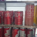 Customer photo of divider and pusher system for refrigerator storage.