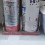 Drink pusher system installed with fixing clips and divider track.