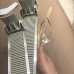 Verified buyer photo of shelf pusher lanes used for beverage merchandising.